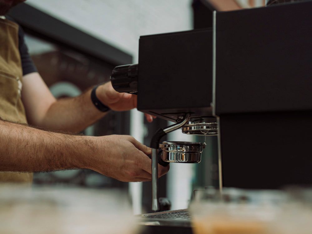 Barista pulling an espresso shot on the Krema coffee cart