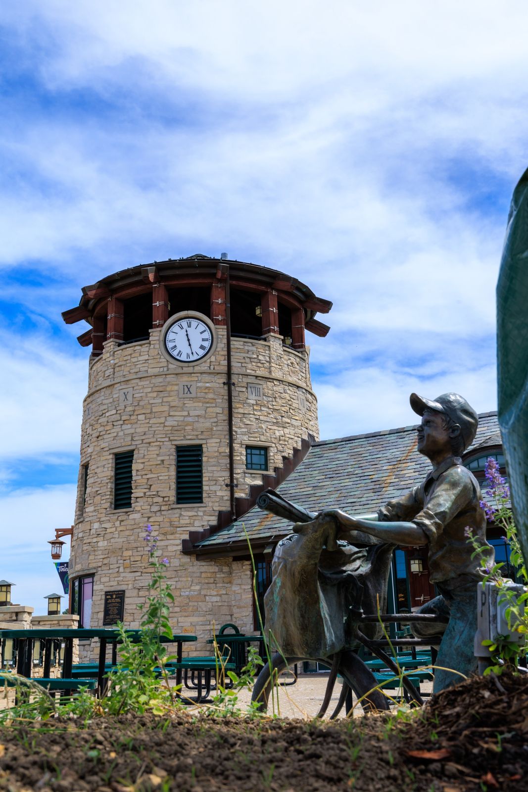 Stone clock tower against the sky